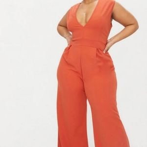 Pretty little thing rust plunge wide leg jumpsuit